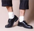 Black-trousers-white-socks-ben-beltman-istockphoto-425c397282-pixels-300x272